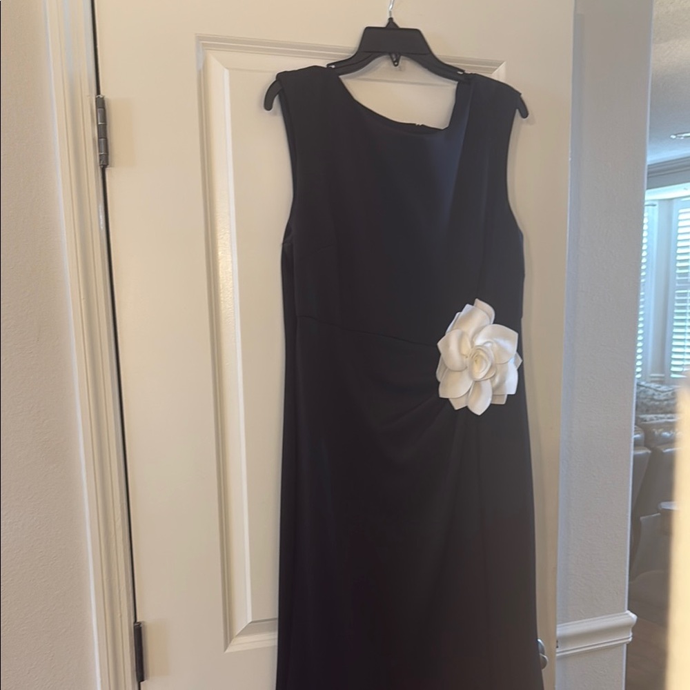 Elegant Black Dress with White Floral Accent